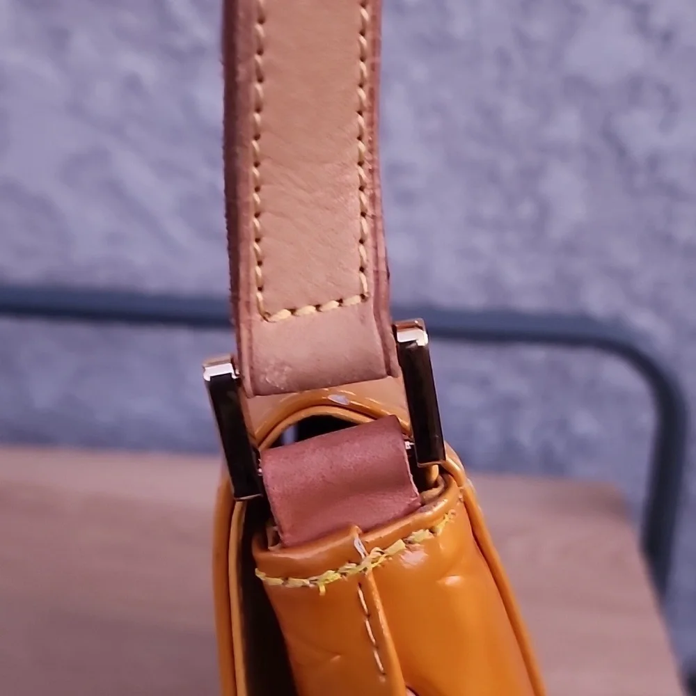 Louis Vuitton THOMPSON STREET VERNIS IN MANGO